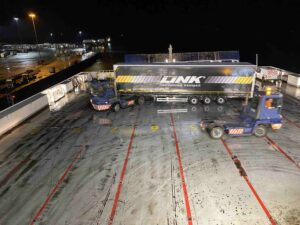 A large articulated lorry turns around on the deck of Stena Holandica, a Ropax ferry loading at Harwich International.